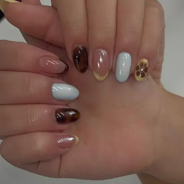 Tortoise Gold Charm II at A-List Nails & Spa Kissimmee